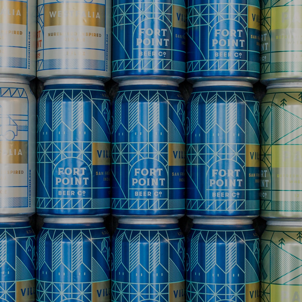 Colorful cans of Fort Point Beer Co.
